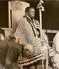 Rain Queen Makoma Modjadji IV seated on the royal chair wearing leopard skin
